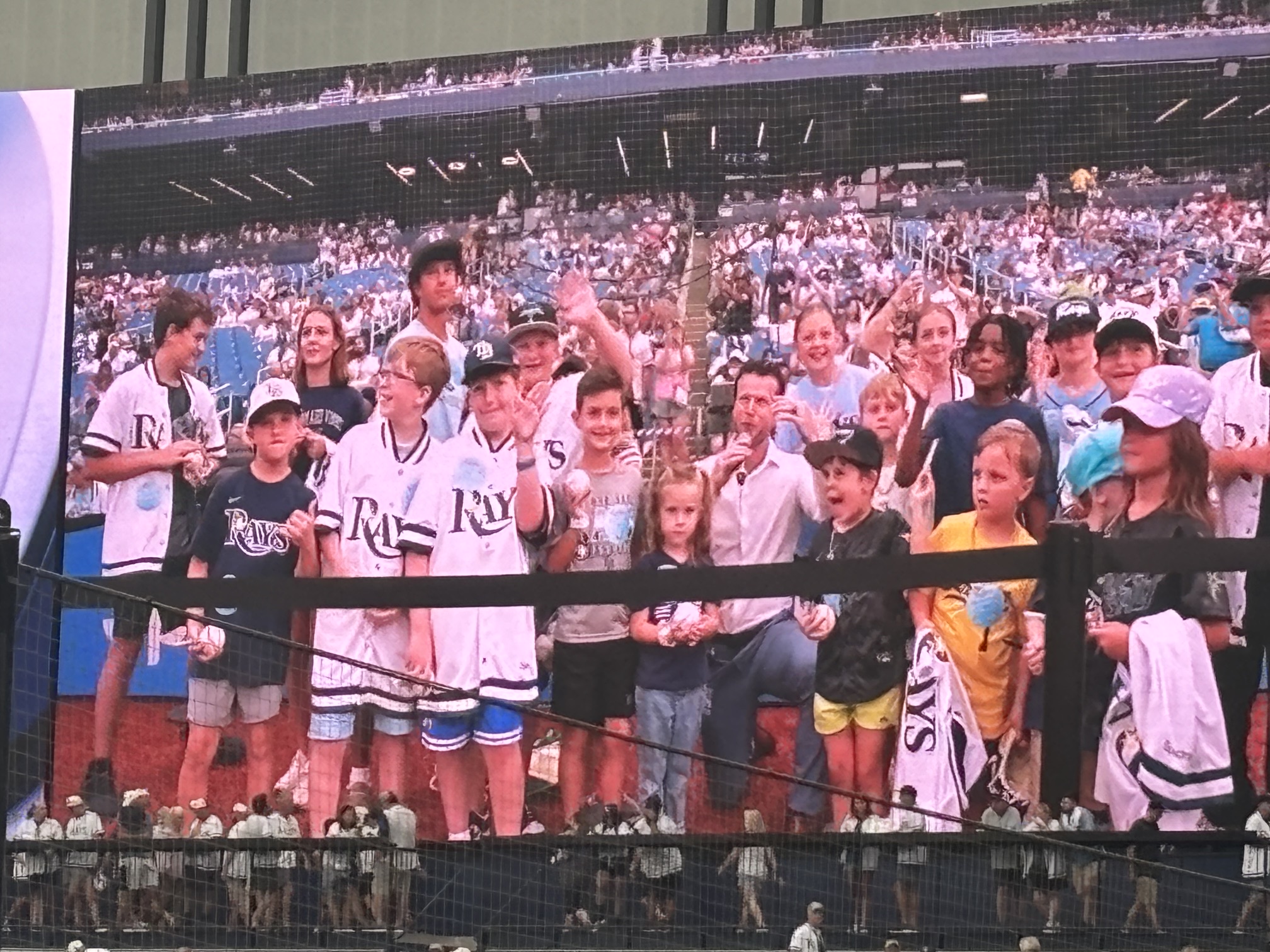 The kids up on the Tropicana Field jumbotron screen